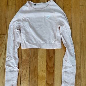 Cropped light pink gymshark top